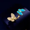 Kadın Top Sınıf Vancelf Orijinal Tasarımcı Küpeler Mavi Kelebek Turkuaz Asimetrik Kulak Beat Logo ile Kişiselleştirilmiş Soğuk Mavi Çam Takı