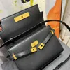 Bolsas de couro genuínas Bolsas de grife feminino Vintage Bag de baguete simples Moda Bolsa de ombro de qualidade Bolsa de crossbod