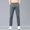 Pantalon masculin d'été étendue mince pour les hommes commerciaux couleurs solides minces consécutives de travail formel décontracté pantalon mâle 28-38