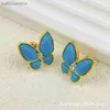 Pendientes de diseñador originales de Vancelfe para mujer Pendientes de aguja de plata elegante de lujo de circón de mariposa con joyas de cobre con logotipo