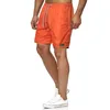 Shorts masculinos 2024 versátil de 5 minutos de calça de praia seca esportiva