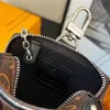 24SS Luxurys designers handväska för män kvinnor läderväska damer reser män plånbok mynt handväska pad filväskor korthållare robot hängningar aocx