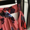 Mujeres Top de manga corta y falda Sets de dos piezas Top de cuello con estampado floral Top de cintura alta Sets a juego de vestidos de vestir de diseño de verano Trajeros