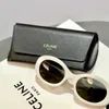 Celies New Sailing Triumphal Arch Panel Lunettes de soleil ovale Cat Eye Ins Black Sunglasses Star Même style 40194nc7x