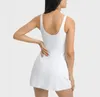 Nya två stycken Kvinnor stretchig sportkläder tennis golfklänningar sexig ärmlös maxi kjolkläder yoga träning sport behåar med avtagbara kuddar