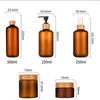 収納ボトル1オンス30g/50g 100g 250gマット琥珀色のプラスチッククリームジャーコメチックコンテナ竹の瓶