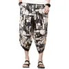Pantalon des pantalons pour hommes imprimé d'été Bloom rétro à imprimé de style ethnique à crampons avec des poches latérales pour les vacances à la plage par jour décontractées