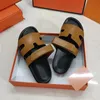 Dames heren platte hak tazz slipper chypre sandaal luxe muilezel glijbaan loafer walk schoenen zomer 10a designer schoen strand lederen sandale rubber zool oranje bodem schuifregelaars