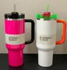 Sakura Pink 40oz Tumblers Neon Green White Quencher H2.0 koppar med silikonhandtag lock och halm vinterrosa svarta bilmuggar mors dag gåva