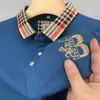 Nuova maglietta a maniche corte per uomini in cotone estivo con collare da polo ricamato a mezza manica a manicotto per uomo