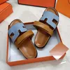 Zomer chypre sandaal buitenshuis dames tazz slipper luxe zonnige ontwerper glijbaan mannen plat schoen lederen sandale mode witte schuifregelaars strand pool pool casual zwarte muilezel schoenen