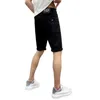 Designer de shorts masculino British Style Style Tridimensional Steel Label de aço preto e branco Lavagem masculina shorts jeans casuais com uma lisada de perna reta Micro Elasticidade i3mt