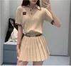2024 Early Spring New Designer Dress Academy Style Contrast Striped Polo Neck Short sleeved Knitted Shirt Top pleated skirt set