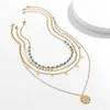 Stil turkosa etniska smycken pärlstav i benbenshalsbandet kvinnlig blommor