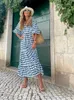 Grundläggande avslappnade klänningar Boho Maxi klänning kvinnor blommor tryck sommarlovstrand klänning kvinnlig kort puffhylsa lös sundress green vestidos mujer 240419