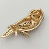 Kkgem Animal Jewelry 19x46mm Cumbic Zirconia Pave Gold Color Owl Brooch Broch - Bird CZ Brooch pour pull accessoires 240411