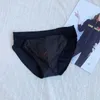 Onderbroek Sexy Mens String Homme Fashion Gedrukte Low Rege Slops Lingerie Bulge Bouch Bouch Underwear Ademend slipje Tanga Slip