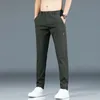 2024 Koreanska herr Golf Slim Fit Pants Ice Silk Breattable Leisure Sports Pants Fashion Pants 240419