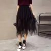 Jupes femmes jupe en tulle féminin élégant avec une taille haute taille à taille élastique ourlet midi élégant pour la mode de streetwear