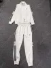 Kadın Joggers Sporting Sweatheruit Tasarımcı Kıyafetleri Yüksek kaliteli sağlıklı kumaşlar Uzun kollu, gündelik pantolonla eşyalı fermuar ceket iki parça set