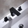 Rubinetti del lavandino da bagno design di moda di alta qualità in ottone rubinetto nero 3 fori 2 manici per bacino mixer tocco di acqua fredda bagni d'acqua fredda