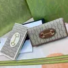 Designers portefeuille zippy en cuir souple mens pour femmes nouvelles à la mode et à apparence haute chaîne de portefeuille pour une épaule à bandoulière