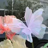 Fleurs décoratives 50 cm papillon artificiel Gauze Gauze en plein air Fake Wedding Party Decoration Pographie accessoires 3D Fil de soie