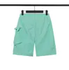 Designer masculino shorts de nylon de metal hight street shorts esportivos rápidos secagem de roupas de banho de praia calças de praia