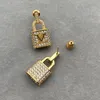 Designer de moda Gold Lock Diamond Brincos para mulheres Senhoras personalizadas de alta qualidade Aço inoxidável Brincos de joias de joias