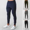 Calças de corrida homens esportam calças de moletom de corredores de algodão Trackpants de algodão Slim Fit Bodybuilding Troushers 240418