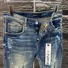 lila varumärkesjeans 2024 Nya designer jeans för kvinnor och män trendiga modebyxor hiphop män jeans orolig rippad cyklist smal fit motorcykel denim för män