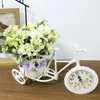 Flores decorativas decoración de la oficina en el hogar relojes artificiales bicicletas canasta de flores set de seda para la fiesta de boda flores de escritorio interior