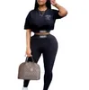 Neue Designer-Sommer-Frauen-Freizeit-Tracksuits zweiteilige Anzugsets kurzes T-Shirt+Hosen gedruckte Kurzarmnabel exponierte Top und Shorts Outfits Schweißanlagen