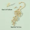 Pendientes colgantes de la oreja coral personalidad de metal izquierdo derecha de cadena asimétrica para mujeres joyas de moda aretes de Mujer 2024