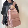 バックパックソリッドカラー女性リュックサック10代の女の子大学の学生帳バックパックモキラフェミニナ用の大きな学校のバッグ