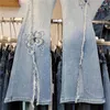Kvinnors jeans tunga industrin fjäril broderad strass 2024 Våren och sommaren hög midja slits stretch bootcut byxor kvinnor
