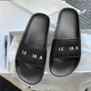 Gummisula designer pool glid sandal platt häl lyxsko för kvinnors män tofflor