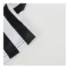 Nieuwe zwart-wit gestreepte geribbelde revers unisex scheidsrechter T-shirt korte mouwen