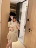 Two Piece Dress Designer 2024 early spring new college style contrasting striped polo neck short sleeved knitted shirt top pleated half skirt set for women QP38