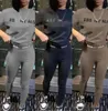 Designer Dames Tracksuits Silmbroeken Pak Twee stukken Jogger Set 2024 Nieuwe letters Gedrukte panty's met korte mouwen Sweatsuits 3 Colors Fashion Clothing 65365