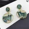 Stud Earrings Metal Circular Hollow Out European And American Style Personality Fashion Pendant Ms Travel Accessories