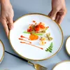 Tavoli da tavolo in porcellana stocca piatti e ciotole bianche per piatti in ceramica nuziale con bordo d'oro