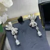 Boucles d'oreilles à étalons en diamant de bow à arc sterling de haute qualité pour filles