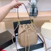 Novos designers Bolsas de ombro mulheres bolsa de couro velha bolsa de balde famosa bolsas de cordão famosas bolsa de corpo cruzado moda simples muito boa