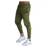 Herenbroeken ontwerper joggers sportscholen casual elastische spier katoen mannen s fitness workout magere joggingbroek broek jogger bodybuilding dro otwgbb