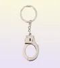 Simulering Handcuffs Metal Keychain Car Key Bottle Opener Män och kvinnor Keychain6778697