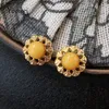 Pendientes de tachuelas Round Natural Amber Europa Mujeres Trendy Stone Báltico Joyería Báltica S925 Regalo de flor de oro plateado