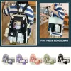 Sacs d'école 5pcs / set kawaii femmes sac à dos coréen mignon sac à dos mignon fille fille grande capacité carbag schoad swech