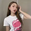 Designer Live Broadcast of Xiaoxiangjia Skiing 3D Pink White Love Versatile Girl, mostrando uma blusa mais fria com mangas curtas