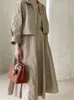 女性のためのドレス秋のターンダウンカラーソリッドロングスリーブコートノースリーブドレスセット韓国ファッションレディース服240417